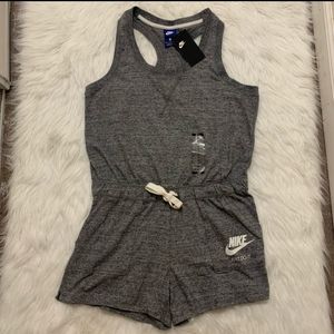 New with tag Beautiful Nike grey Romper .